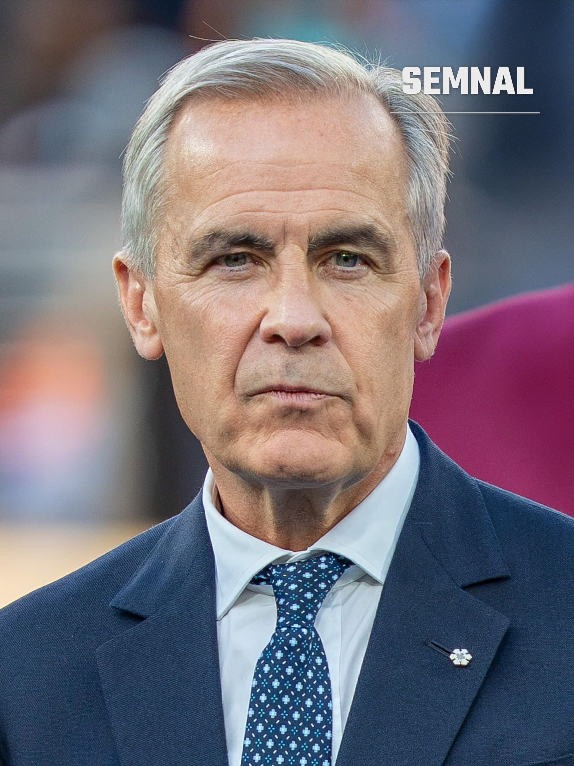 Mark Carney, premierul Canadei, într-un portret în prim-plan, în costum bleumarin, cu cravată albastră cu model. (Foto: Bryan Berlin)