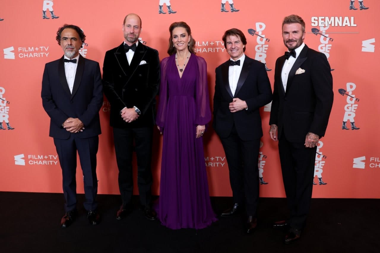 Alejandro G. Iñárritu, Prințul William, Prințesa Catherine, Tom Cruise și David Beckham pozează în fața unui panou portocaliu cu sigla filmului Digger