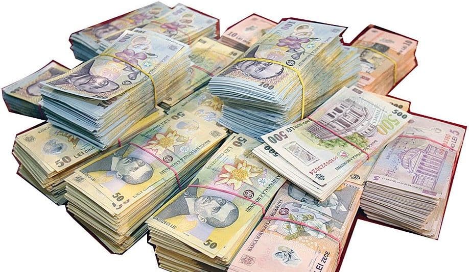 Bani îngropați, găsiți la percheziții în Dâmbovița