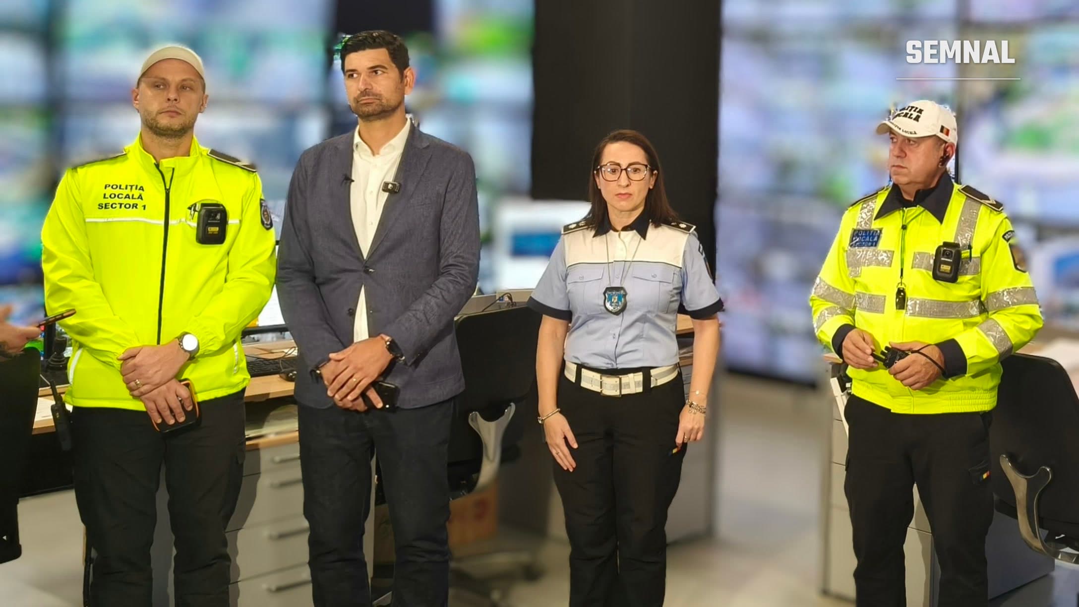 Primarul Sectorului 1, George Tuță, directorul general Mihaela Rădulescu și doi polițiști locali în dispeceratul Poliției Locale Sector 1