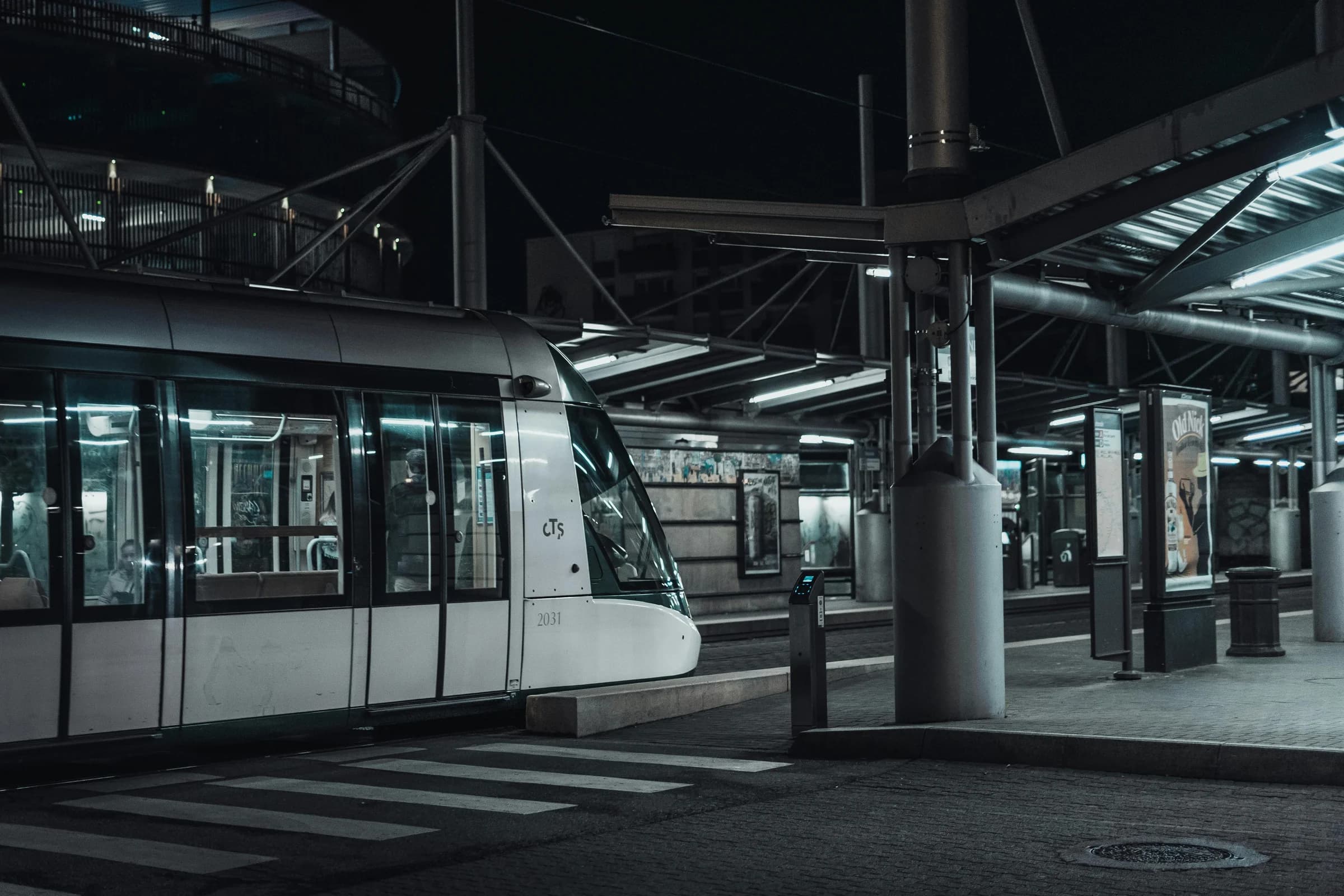 A modern tram station in Strasbourg, France, captured at night. Urban transportation and architecture.