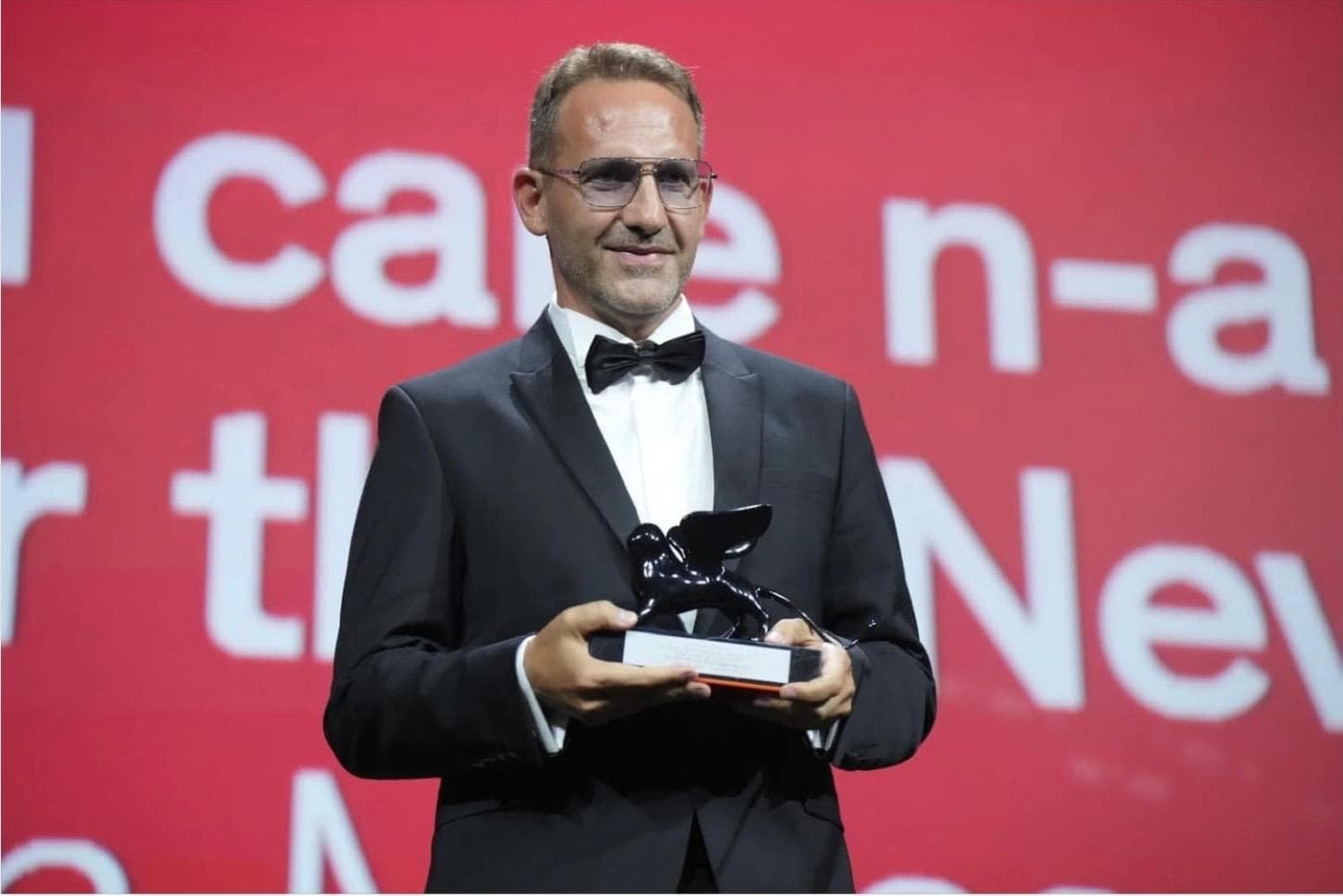 DIRECTOR BOGDAN MURESANU WINNING A RECORD OF 4 AWARDS FOR ANUL NOU CARE N A FOST IN VENICE